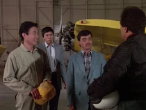 Some of Zung's hitmen/pilots. With the yellow cap is Ko (Sab Shimono) who murdered Diem. Next to Zung is Hua (Byron Chung). The one at the back is uncredited.
