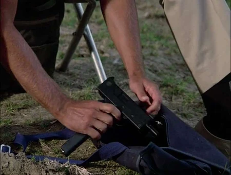 Rogers gets his MAC-10 ready for the kidnapping of .