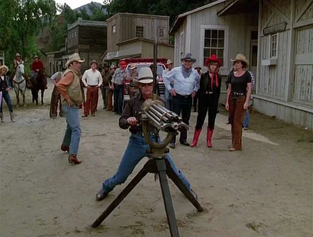 Hawke demonstrates the Gatling gun during Annie Oakley's stunt men tryouts.