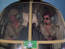 The pilot on the left is Delaney. Vidor calls the one on the right Steadman. He is not credited.