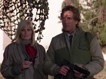 Elena with her Walter PPK and Steele, the leader, with his MAC 10. Both weapons have suppressors.