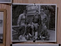 This picture is in Chester's hands when he dies. He's at the back by the sign. Jake O'donnel is to his left. It isn't used much as a clue but it does direct Kevin to Van Nuys where he meets the Santini Air crew.