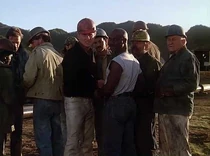 Oil workers-wildfire.jpg (18 KB) A shot of refinery oil workers. Noble Flowers (Lance Legault) is in the red helmet. Moose is in white.