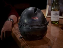 The helmet of Bo Dai Thung, the North Vietnamese ace whom Vidor shot down. On the visor are the words "And they are us".