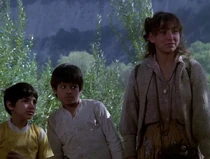 Solita-jennie.jpg (33 KB) Debra Yon as Solita (right). She has a lot of scripted action including a scene where she fights against a bandit or enemy soldier who attacks their group. The two boys with her are not credited. On the left is Eluid, and center is Javier.