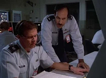 Larry Margo (right) and Duncan Wilmore (left) as two controllers at a US radar station. Hawke needed to talk his way past them about deviating from the flight plan.