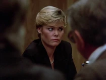 Margo Brewster-Santinis millions.jpg (35 KB) Margo Brewster, Barron's granddaughter, at the board meeting. Graydon underestimated her because he thought she was only a pre-school teacher. This nicely framed shot shows she can be firm and decisive--she has "Barron blood" in her, as Dominic says.