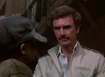 Charles Knox Robinson as Carl Zimmer, a KGB officer who plans to trade Ho Minh for a USAF tactical fighter.