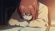 Shirayuki wakes up after falling asleep at her desk.