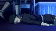 Obi lies unconscious as Shirayuki is being kidnapped.