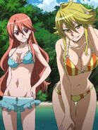 Chelsea and Leone wearing bikinis