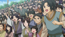 The residents of Chi'Shin cheers to Lee Geun-Tae during the Battle Game Festival.