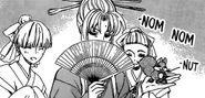 Ao eats acorns from Iguni's hand