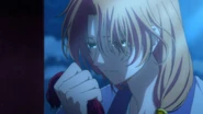Soo-Won holds Yona's lock of hair as he mourns over her death