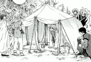 Yoon shows everyone the tent he made them