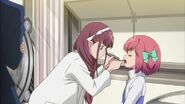 Yukirin examining Nagisa's mouth.