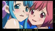 Chieri and Nagisa taking pictures at the beach.