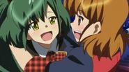 Takamina and Yuuko celebrating the news.
