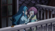 Chieri put an orange in Nagisa's mouth.