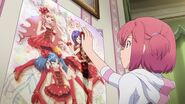 Nagisa and her poster of AKB0048