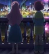Nagisa and Orine looking out onto Akibastar at night from their balcony