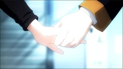 Chitaru and Hitsugi holding hands.