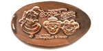 A Tokyo DisneySea pressed medallion made for Mickey & Duffy's Spring Voyage, featuring the Genie, Duffy and ShellieMay.