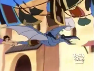 The Creature flies through the sheets of laundry with Aladdin before he grabs the sheet of laundry and puts on The Creature's face.