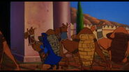 Cassim and the camels walking to the stables of Agrabah