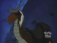 Saurus watched as The Mukhtar sniffs the ground to find The Genie.