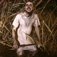 A Taken Thrower in a patient gown