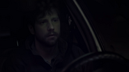 Jake driving to the Mountain Air Motel.