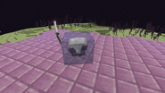 A Mimicube that has copied an Iron Sword and Helmet.