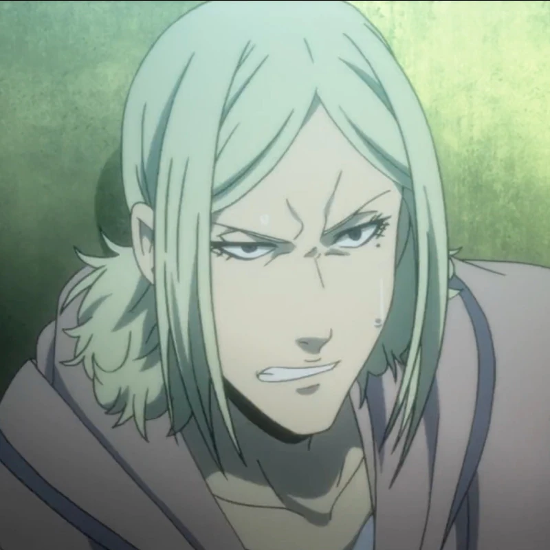 A young man named Shuntaro Chishiya with blonde shoulder-length hair, a mole under his left eye, and wearing a light, dull pink hoodie