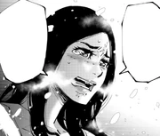 Onoue crying surrounded by snowflakes