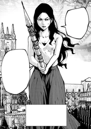 Onoue holding one of the towers from a replica as a sword pointing it forwards