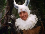 Sid Caesar as The Gryphon in Alice in Wonderland (1985)