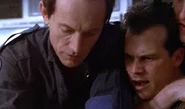 Hudson being "volunteered" by Drake for Bishop's "knife trick".