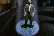 Mr. Bean standing up after being beamed down