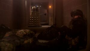 The Dalek kills the guards