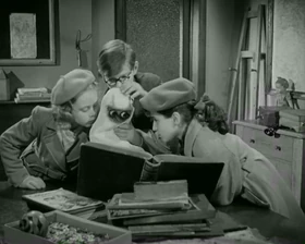 The children hug Meba before he flies home.