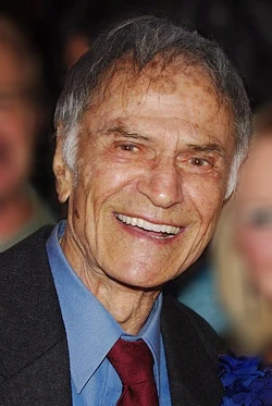 401px-Jerry Springer Larry Storch Geri Reischl 2011 David Shankbone (cropped)