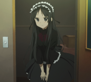 Mio in her black dress