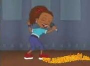 Susie sings on stage before getting discovered.