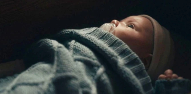 Philip Lying in his Crib