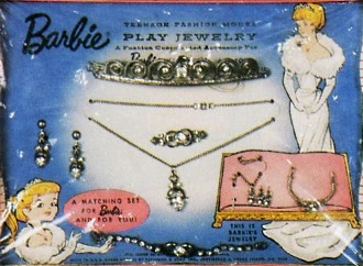 If sold today, Mattel would include a girl's size  and .