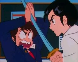 Stopping a razor-sharp blade requires only your hands... at least in a cartoon.