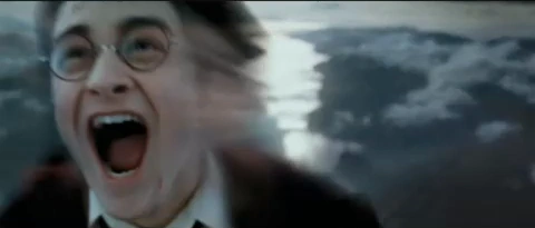 Harry charges the camera making his O-face.