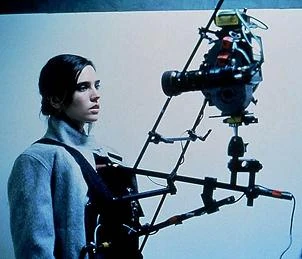  being devoured by camera equipment.