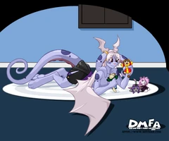 Mink playing with dolls